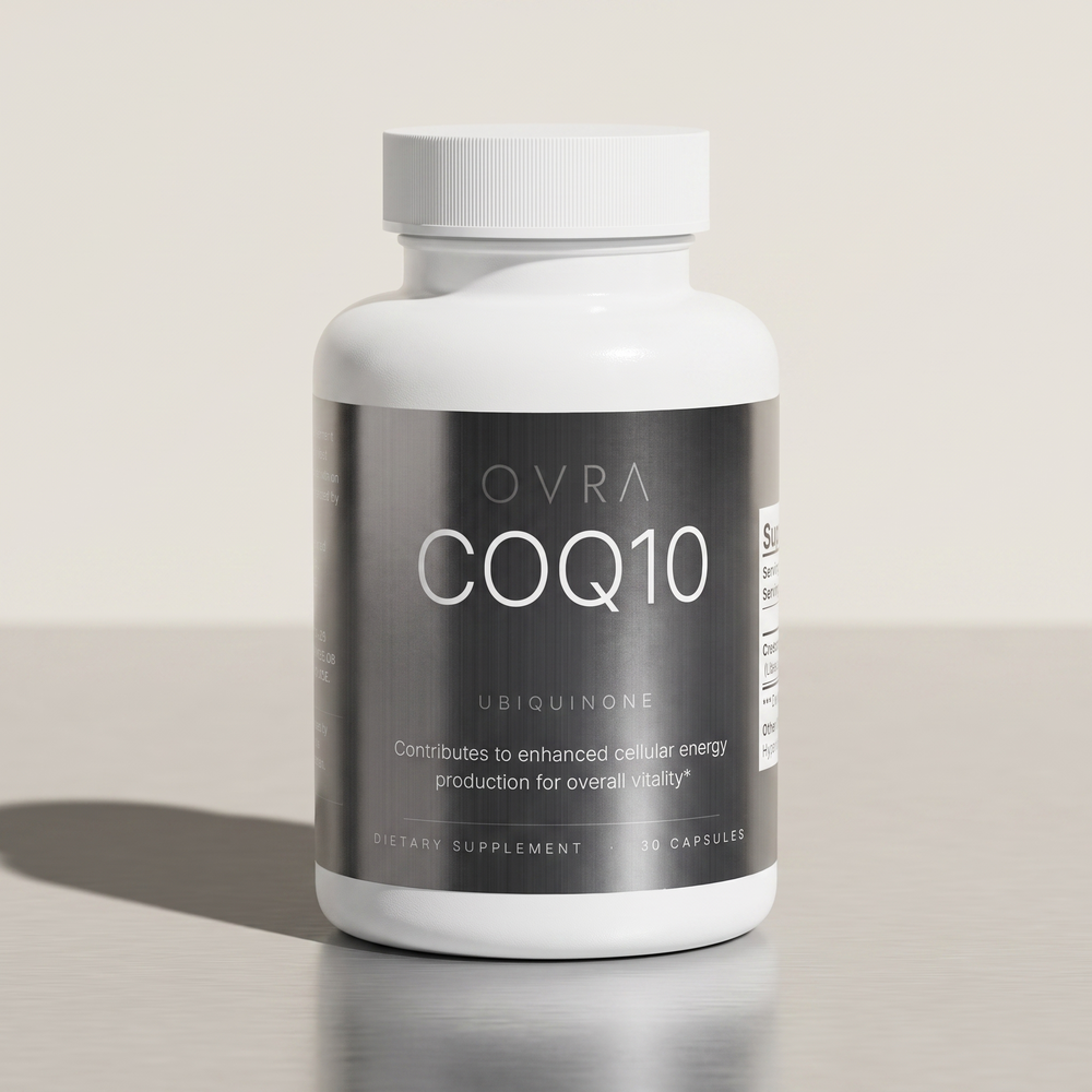 OVRA CoQ10 bottle on brushed steel, bone-white studio background