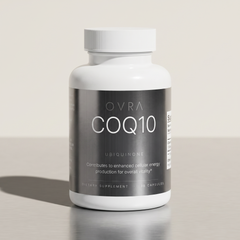 OVRA CoQ10 bottle on brushed steel, bone-white studio background