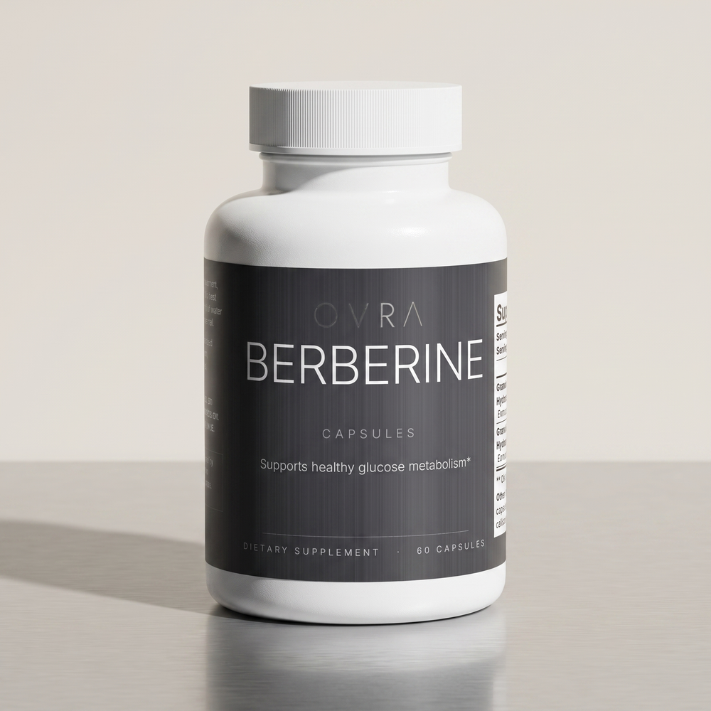 OVRA Berberine bottle on brushed steel, bone-white studio background